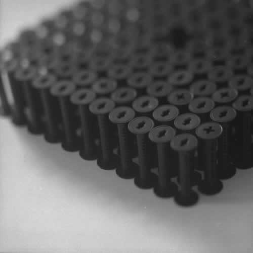<body>
<p>This work was initially conceived of as a nod to the Terracotta Army of the Qin Emperor. Seeing that the film size ‘120’ for which these spools were manufactured is numerically 11²-1, I arranged this as a phalanx of 11 ranks of 11 and left the centre element out.</p>
<p>I thought I could also look at this omission as a flaw in the lattice and to see how the structure behaved over time, perhaps to model the corruption of power while I worked on the Dissent project with Chapel Arts. </p>
</body>
 Images Copyright Aldobranti® ©2008-'2025. All rights reserved.